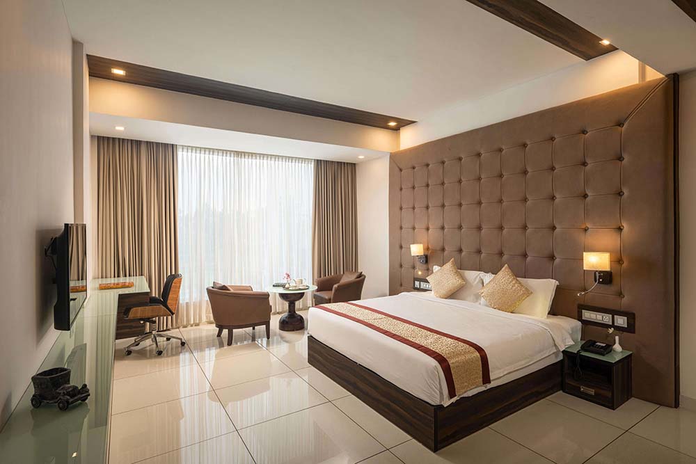 Inviting Deluxe Room featuring modern furnishings at Blue Serene