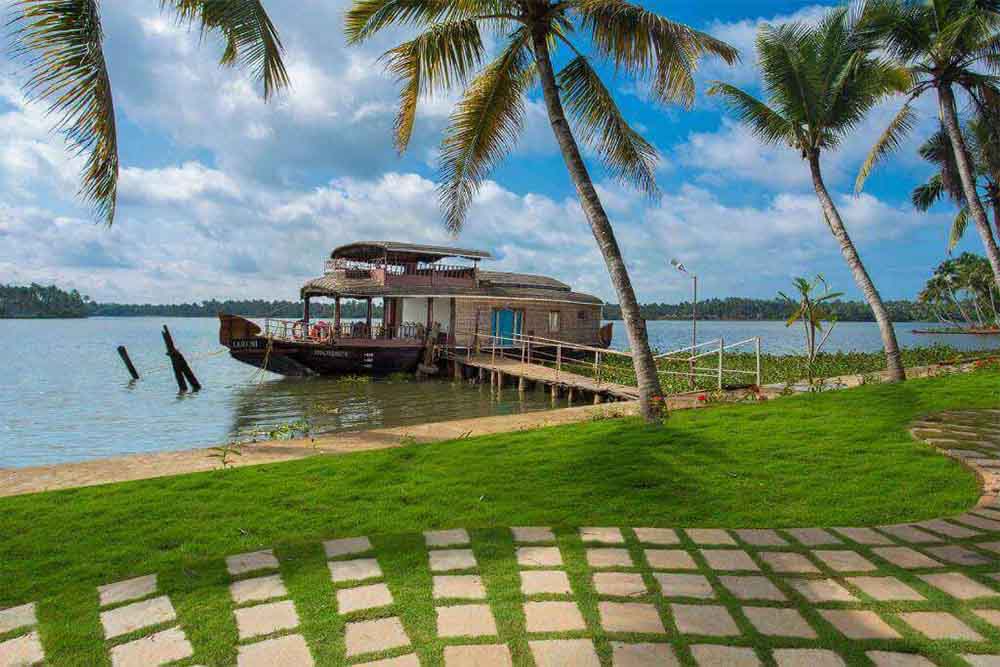 A serene pool area surrounded by lush greenery at Blue Serene